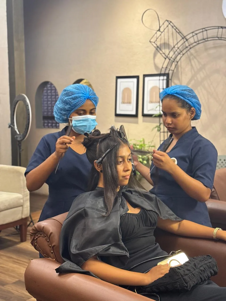 CHANRI stylists working together on a client
