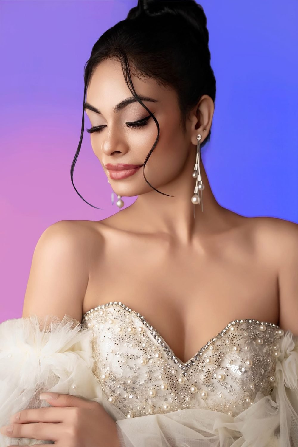 Bridal glam makeup with pearl detailing by CHANRI